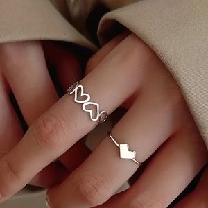 New; Simple 2 piece adjustable love ring set with a Creative Design